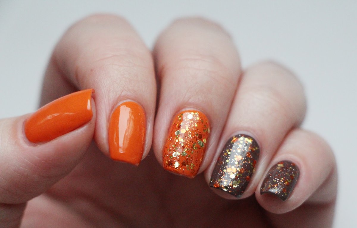 Зимний оранжевый маникюр, оранжевые ногти зимы 